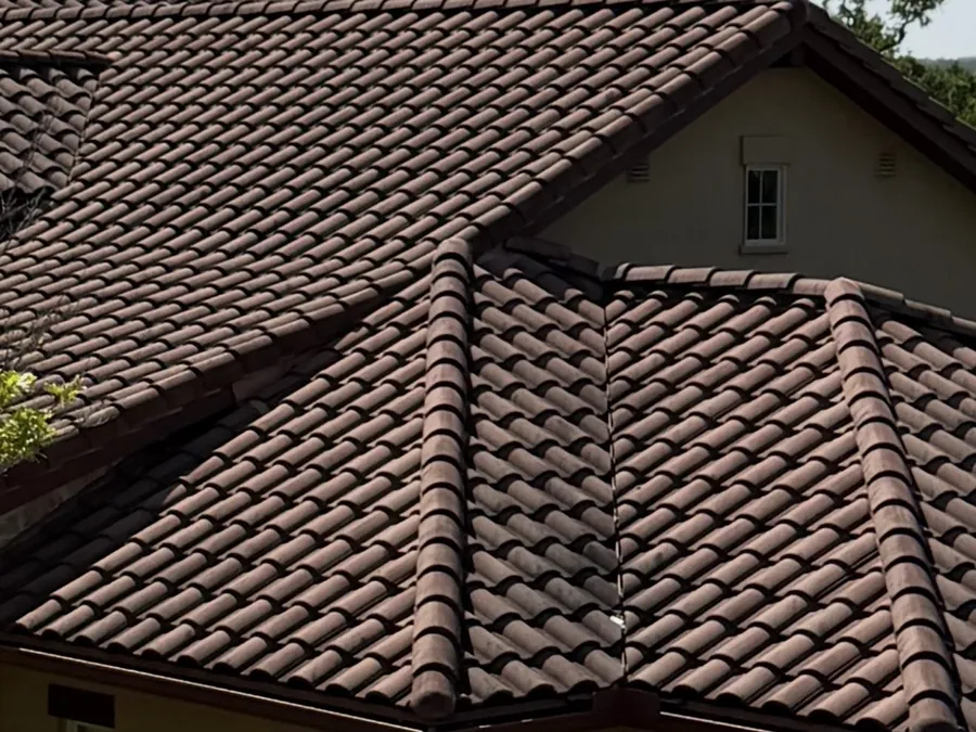 Clean tile roof on a Hill Country home after professional roof soft washing
